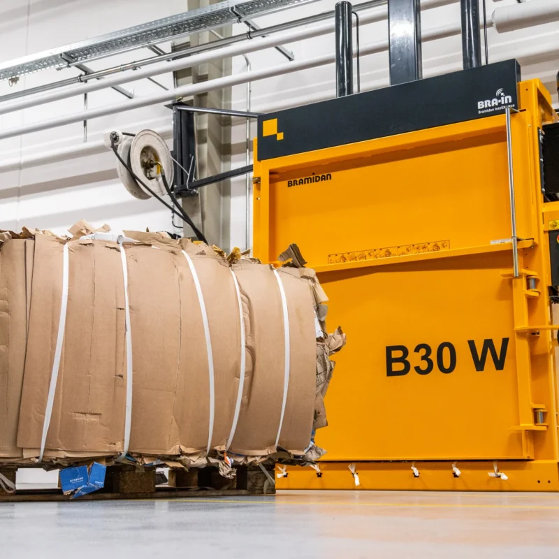 B30 Wide baler with cardboard bale in front
