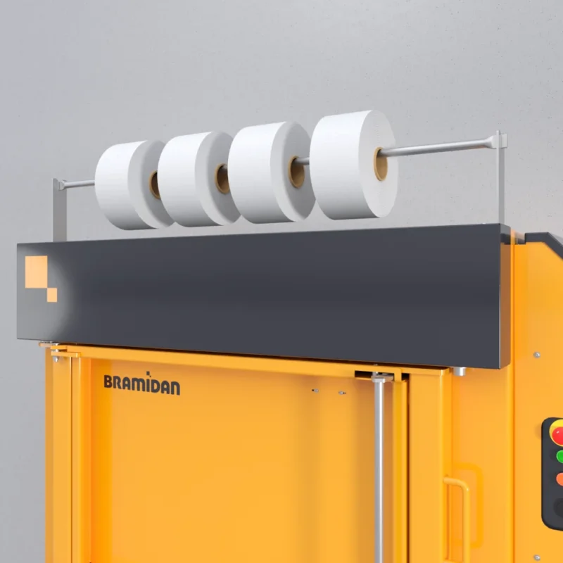 Strap holder on X10 baler