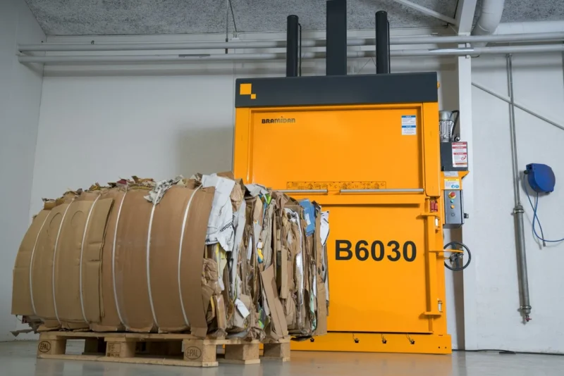 B6030 baler with mill sized bale.