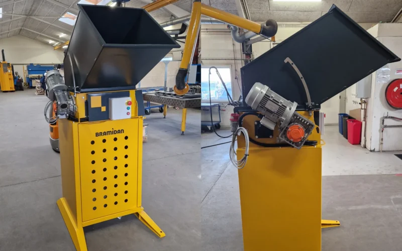 Man placing waste in Safety EPS Granulator Galv